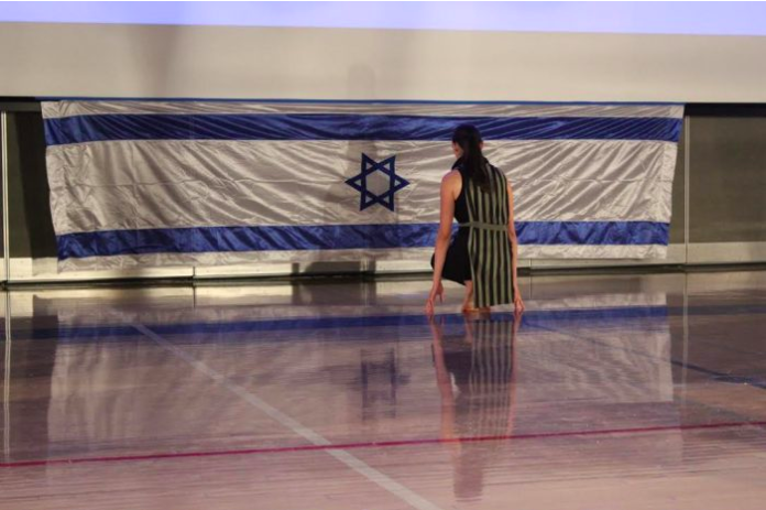 This photo from the Milken Roar, by Jordan Pardo, illustrates an opinion article about the schools ending its Hebrew language requirement. It won first place in the category of Photograph attached to any Jewish or Israel-related story.