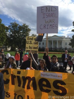 A crowd gathers outside the white house to protest the actions of Israel.