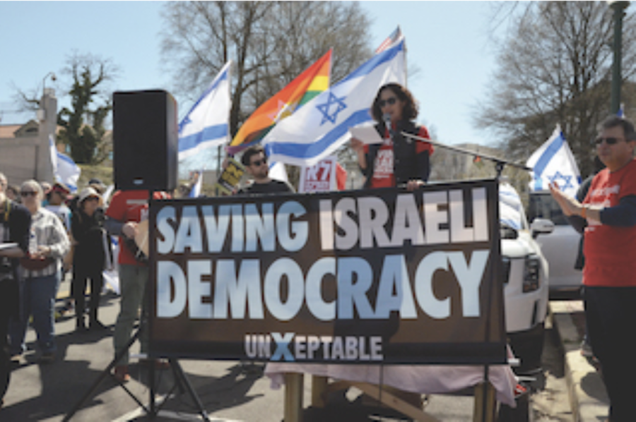 Protesters stand outside the Israeli embassy on March 26.
