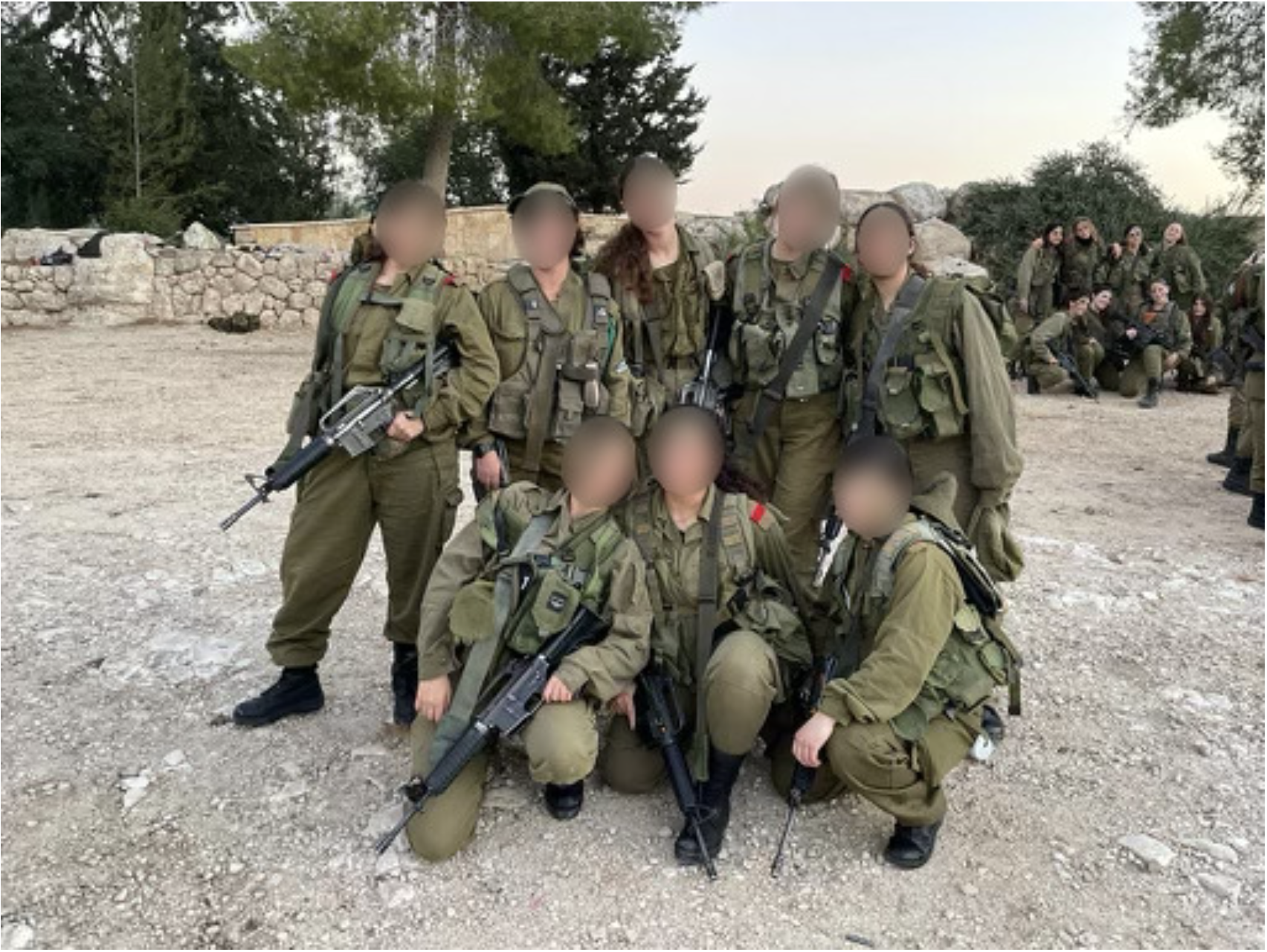 UNIT: Carin A. ‘22, bottom row center, with her fellow soldiers before the Israel-Hamas war broke out. 