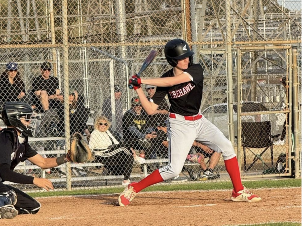 

SWING: Co-captain Ari Elad at bat at a Firehawks game from earlier in the 2024-2025 season.
