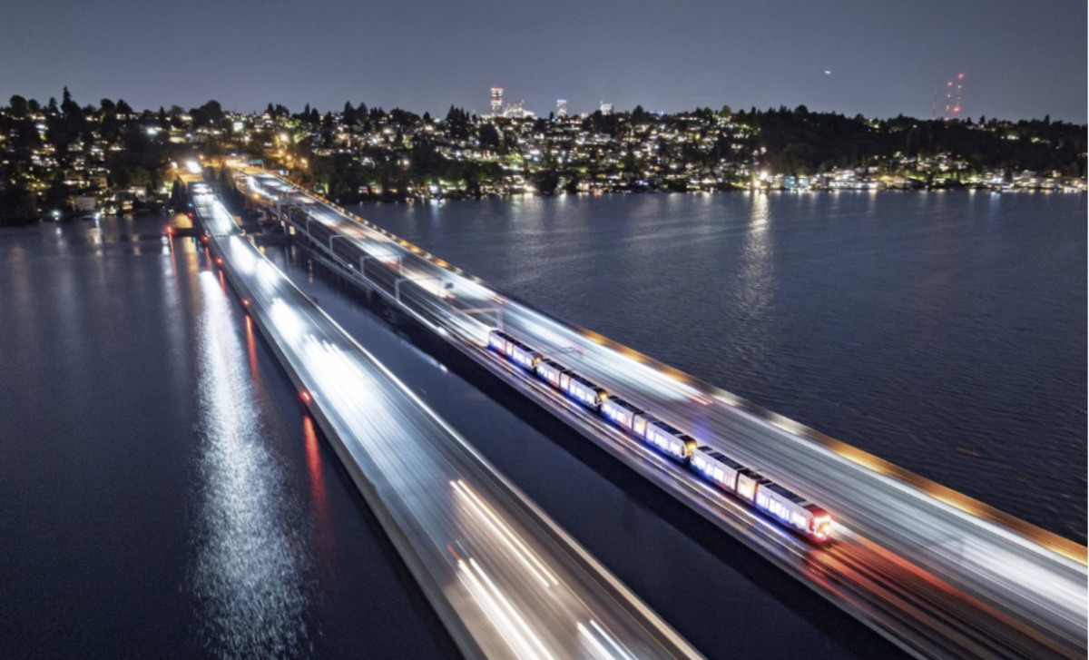 A four-car light rail vehicle (LRV) crosses the I-90 floating bridge during Crosslake livewire testing on Oct. 8, 2025. 