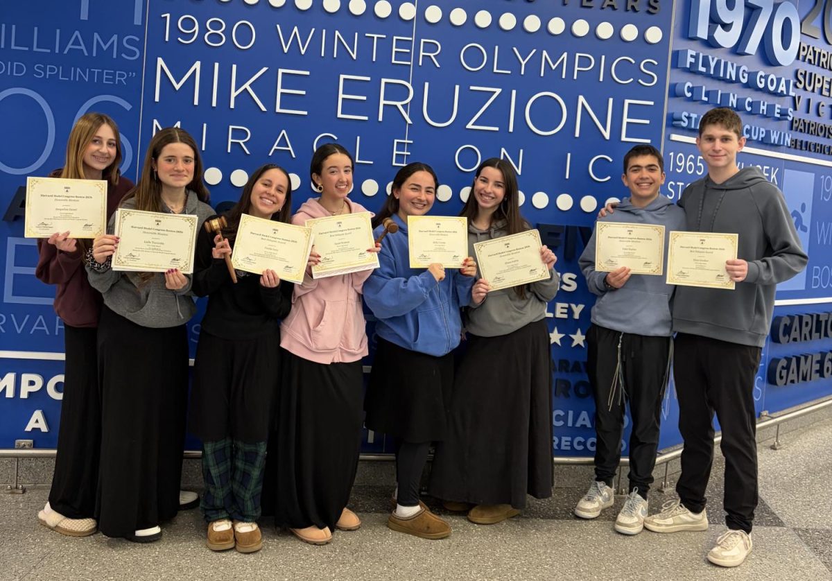 Students proudly display their awards. From left to right: Jacqueline Zamel (‘28), Lielle Tsarovsky (‘28), Freida Levy (‘27), Sarah Ryzman (‘26), Bella Uretsky (‘26), Eliana Sufrin (‘28), Yakir Kaplan (‘28), and Eitan Gershov (‘26). (Image courtesy of YULA Instagram)